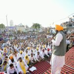 Chief Minister Bhagwant Singh Mann speaking during a Lok Milni programme at village Sarinh in Nakodar constituency of Jalandhar district