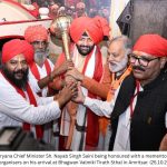 CM Receives a Warm Welcome at the Tirath Sthal, Distributes Tricycles to Beneficiaries